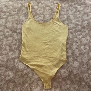 Yellow Garage Bodysuit